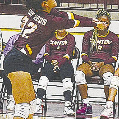 Clinton’s Sammy Meraz returns the ball over the net during the Lady Reds’ match against Weatherford Tuesday in the Tornado Dome. CDN | Sam Goodwyn