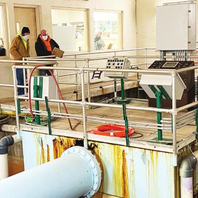 Roger Roderick, left, and Mike Winterer of Fab Tech check out the inside of the Clinton Lake Water Treatment Plant before rehabilitation work commences. RO plant will soon provide more water
