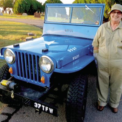 Elizebeth Wilson dresses as Dolly Sauter for the Clinton Cemetery Tour in 2015. The jeep was a former Army jeep that was owned by Don Diemund. She will be presenting Sauter again this year. CDN | Courtesy photo