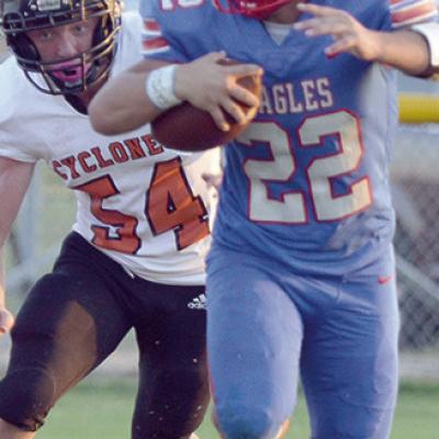 Evan Donaldson makes a man miss and cuts up the field for more yardage. CDN | Josh Jennings Burns Flat concludes regular season with a win