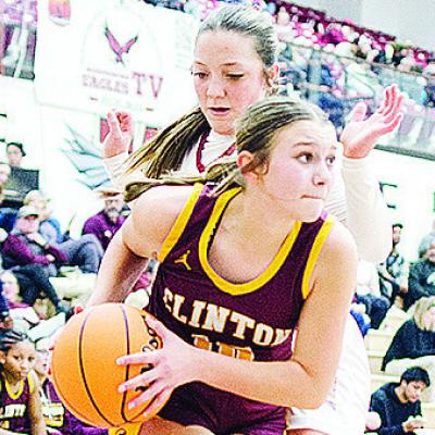 Clinton’s Hadley Meget fights through a Weatherford defender this season. CDN | Sam Goodwyn