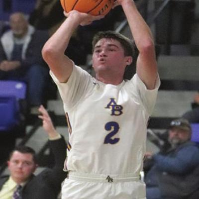 Brett Griffith attempts a three-pointer in the season opener versus Granite. Griffith led A-B with 12 points versus Arnett. CDN | Adam Ewing Arapaho-Butler cruises versus Arnett