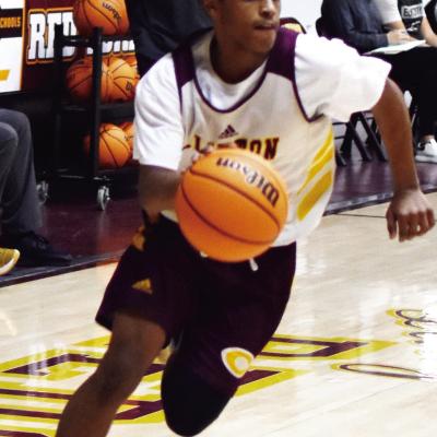 Derron Jackson looks to drive to the bucket during a JV game for the Red Tornadoes. CDN | Emily Stephens Article Image Alt Text