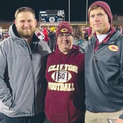 Dex Felch, pictured right, celebrates after the 2021 semifinal win against Elk City with his mother, Deidre Swails center, and his brother, Bo Felch, left. CDN | Courtesy photo Dex Felch happy he returned home to Clinton