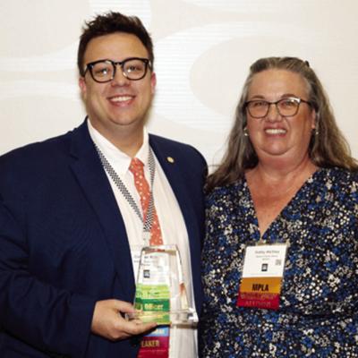 WPLS Director of Customer Experience Conner Kirk, left, is presented OLA’s 2026 New Librarian of the Year Award by Kathy Atchley. CDN | Courtesy photo