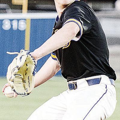 CDN | Sam Goodwyn Arapaho-Butler’s Jiles Southall goes into his wind up as he prepares to pitch during the Indians’ game against Fletcher during the spring season.