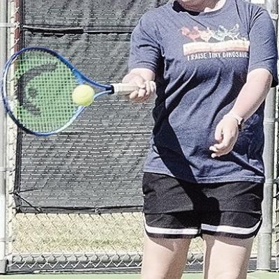 Clinton’s Sami Hammans hits the ball back over the net during tennis practice at the high school. CDN | Sam Goodwyn