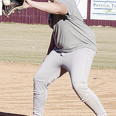 Dustin Hoffman catches the ball at first for the out during baseball practice. CDN | Sam Goodwyn