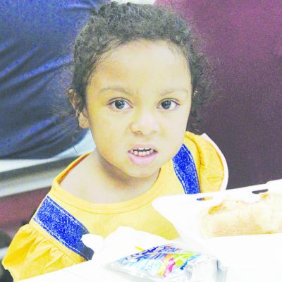 Pre-K student smiles