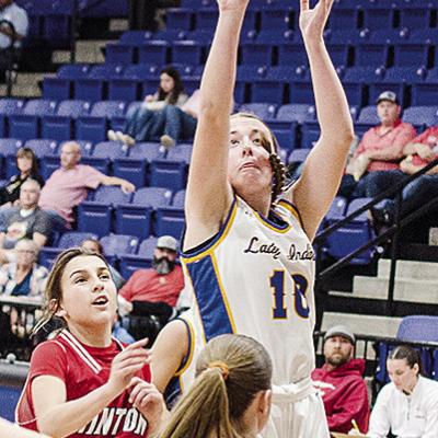 No. 10 Kelsey Garibay shoots over a Hinton defender during A-B’s one-sided win over the Lady Comets Tuesday at home. CDN | Sam Goodwyn