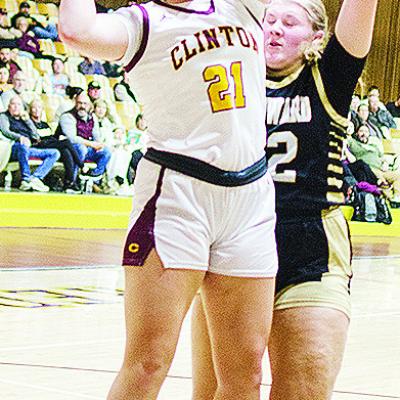 Clinton’s Rhylee Rodebush goes up for a contested layup during the Lady Reds’ home game Friday against Woodward. CDN | Sam Goodwyn