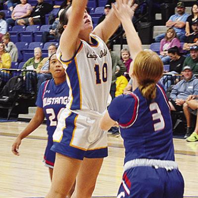 Arapaho-Butler’s Katelyn Garibay lays the ball up over a defender during the Lady Indians’ home game against Fort Cobb. CDN | Sam Goodwyn