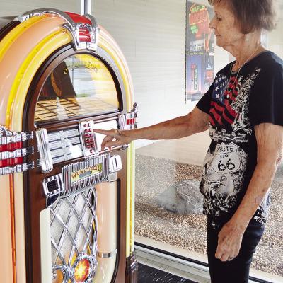 Oklahoma Rt. 66 Museum Director Pat Smith selects a tune from the lobby jukebox. CDN | Micah Ashcraft Oklahoma Rt. 66 Museum Director Pat Smith selects a tune from the lobby jukebox. CDN | Micah Ashcraft