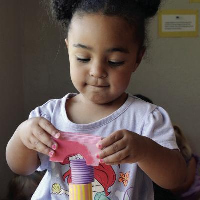 Nora Jefferson shows off her block balancing skills recently at Kingdom Kids Family Child Care at Western Oklahoma Christian School. CDN | Christian Jacobsen