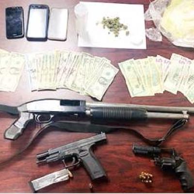 Traffic stop nets 1.03 lbs.of meth, guns