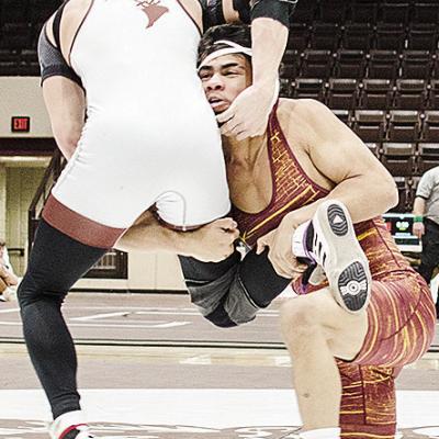 Clinton’s Tyson Brookter attempts a single-leg takedown during the Class 4A District 1 Dual Tournament Tuesday at Elk City. CDN | Sam Goodwyn