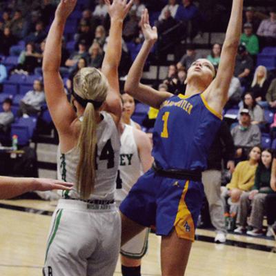 Arapaho-Butler’s Jada Akin takes a shot against Leedey in the Five-County Tournament. Arapaho-Butler swept Canute Tuesday on the road in the final contest before Christmas break. CDN | Staff photo Stretching up