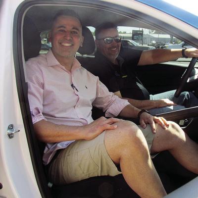 Jason Jackson, left, and Billy Goodwin sit in a 2025 Hyundai Elantra used at DriveSmart Academy 360 in Clinton. CDN | Christian Jacobsen