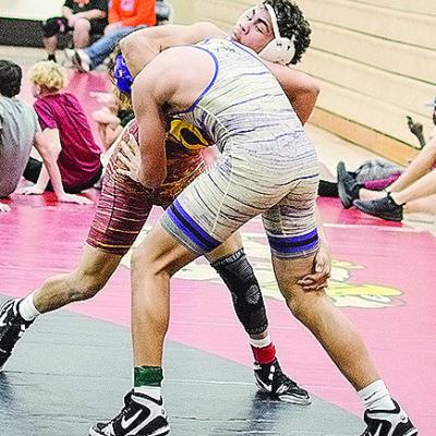 Clinton’s Tyson Brookter, top, grapples with his opponent during the recent Max Dippel Wrestling Tournament in Weatherford. CDN | Sam Goodwyn Clinton’s Tyson Brookter, top, grapples with his opponent during the recent Max Dippel Wrestling Tournament in Weatherford. CDN | Sam Goodwyn
