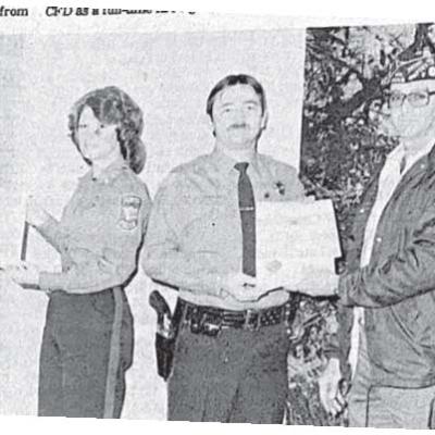 Clinton VFW Club presented Co-Police Officers of the Year honors to the husband-wife team (second from left) of Toni and Ken Thiessen. The certificates were presented by (at left) Don Price and (second from right) Eddie Henderson. Clinton Police Chief Jay Green (right) also attended the presentation. 40 YEARS AGO