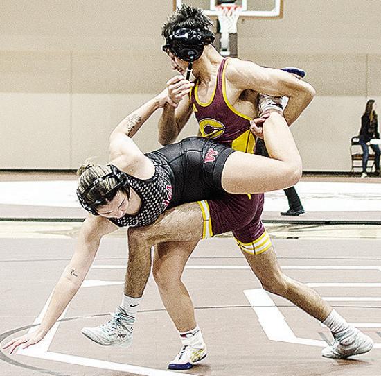 Clinton’s Brandon Rodriguez-Esclalante, right, performs a single leg takedown of his opponent during the Class 4A District 1 Duals Tuesday in Elk City. CDN | Sam Goodwyn Clinton’s Brandon Rodriguez-Esclalante, right, performs a single leg takedown of his opponent during the Class 4A District 1 Duals Tuesday in Elk City. CDN | Sam Goodwyn