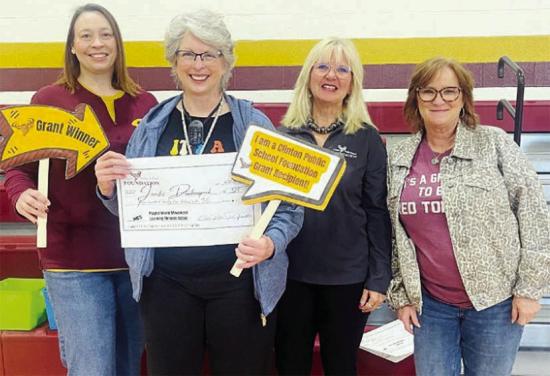From left, Melissa Knabe, assistant superintendent; Jennifer Daubenspeck, grant winner; Debbie Carlisle, CPSF director; and Tonya Gaunt, CPSF director, celebrate Daubenspeck’s grant approval. CDN | Courtesy photo