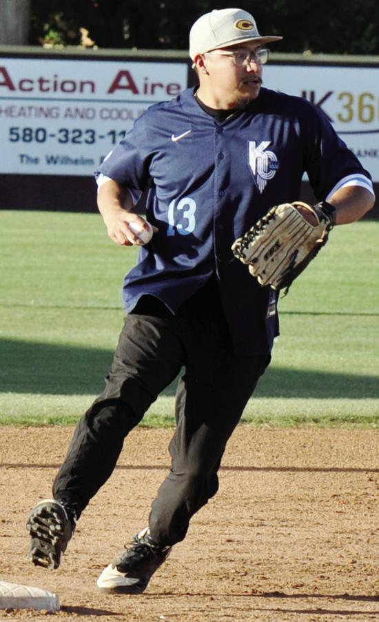 Ben Perez steps on the base for the out during the alumni game at Clinton’s baseball field Friday. CDN | Staff Photo