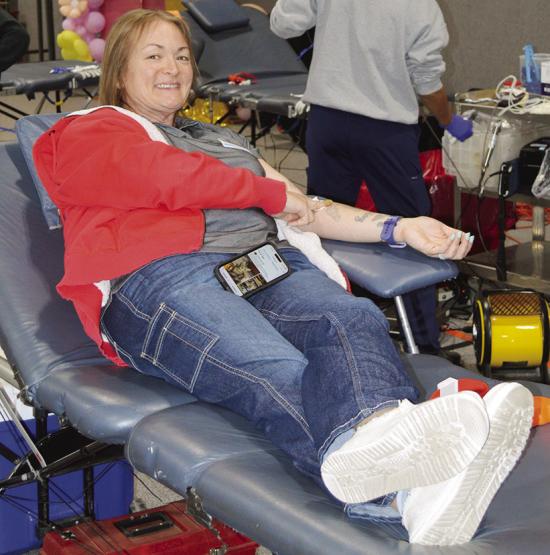Amber Carroll finishes up with her donation Tuesday at the community blood drive at the First Christian Church. CDN | Christian Jacobsen