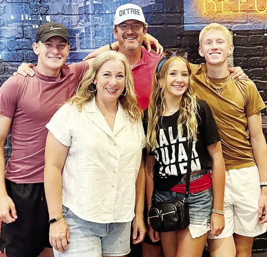 From left, Parker Adams, Erin Adams, Luke Adams, Leah Adams and Ryder Adams pose for a family photo during an outing. CDN | Courtesy photo
