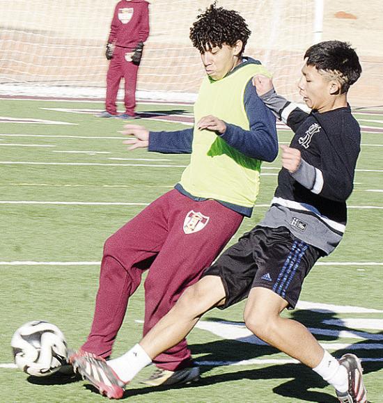 Clinton’s Miguel Zuniga Hernandez, left, and Luis Velez fight for the ball during practice in the Tornado Bowl. CDN | Sam Goodwyn Clinton’s Miguel Zuniga Hernandez, left, and Luis Velez fight for the ball during practice in the Tornado Bowl. CDN | Sam Goodwyn