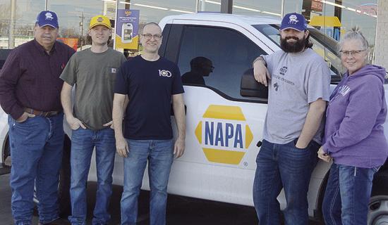 NAPA Auto Parts Employees, from left, Doug Goodwin, Rhett Lambeth, Matt Harris, Grafton Lambeth and Robbyn Dunfee stand in front of the store together after recently being acquired by SportChassis. CDN | Micah Ashcraft