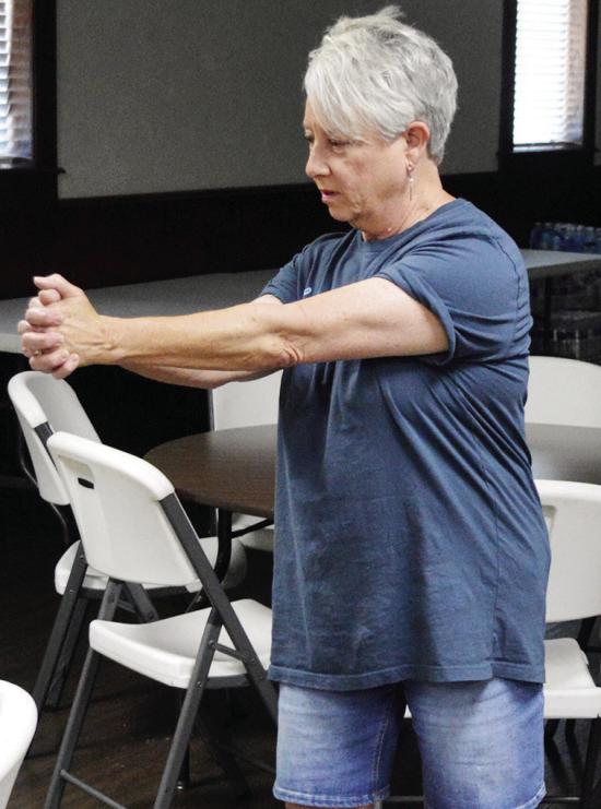 Janice Berrong instructs a strength and balance training exercise Thursday for the “Snap, Crackle, and Pop” women’s group at the First Baptist Church in Clinton. CDN | Christian Jacobsen Janice Berrong instructs a strength and balance training exercise Thursday for the “Snap, Crackle, and Pop” women’s group at the First Baptist Church in Clinton. CDN | Christian Jacobsen
