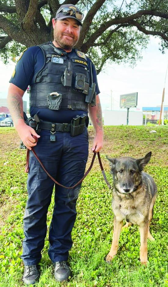 Sgt. Dillon Mach and K9 Mama Bear