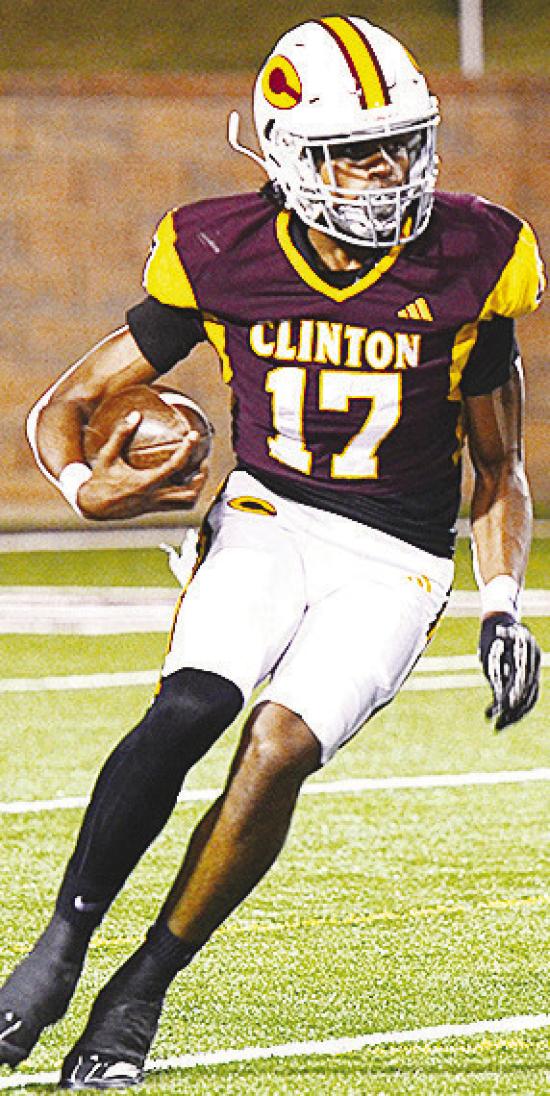 Clinton’s DJ Lister turns upfield after catching the punt during the Red Tornadoes’ game against Elgin in the Tornado Bowl. CDN | Micah Ashcraft