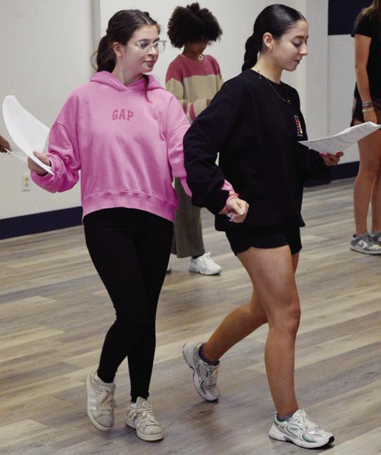 Mayzie Sadler, left, follows Miranda McLean’s “blocking” instructions of where to move Thursday at The Spark Project. CDN | Christian Jacobsen