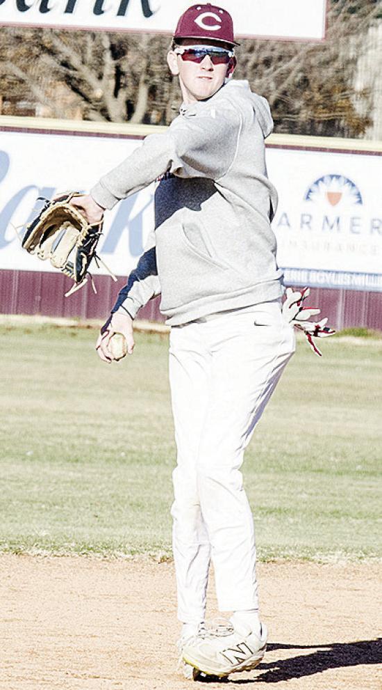 Jeter King throws the ball back to the mound after fielding it during Thursday’s practice. CDN | Sam Goodwyn
