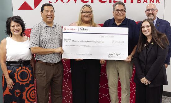 Commemorating a $500,000 housing grant are, from left, Sovereign Bank VP Tribal Relations Manager Debbie Lindsey; Cheyenne and Arapaho Housing Authority Gov. Reggie Wassana; Cheyenne and Arapaho Housing Authority Housing Specialist Joscelyn Tapaha; Cheyen