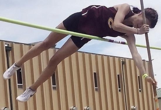 Clinton’s Gabby Hoffman vaults herself over the railing during the pole vault competition in the Class 4A State Track and Field Championship Meet this weekend in Catoosa. CDN | Courtesy photo