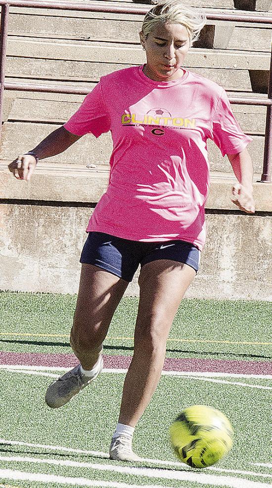 Clinton’s Gianna Burns focuses on kicking the ball during a practice in the Tornado Bowl. CDN | Sam Goodwyn
