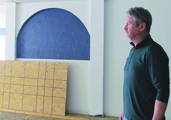 Luke Adams scans the building renovations recently at the new O’Hara and Adams Law offices. CDN | Christian Jacobsen