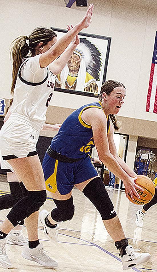 Arapaho-Butler’s Kelsey Garibay drives by a Cheyenne-Reydon defender during the girls’ championship game Saturday of the Western Equipment Classic. CDN | Sam Goodwyn Arapaho-Butler’s Kelsey Garibay drives by a Cheyenne-Reydon defender during the girls’ championship game Saturday of the Western Equipment Classic. CDN | Sam Goodwyn