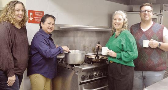 From left, Clinton Rotary Club President Natalie Simpson, and fellow Rotarians Hoi Geswender, Carolyn Heerwald, and Conner Kirk bring the spice to the Frisco Center kitchen ahead of the Rotary Club Chili Day and Silent Auction tomorrow. CDN | Micah Ashcra