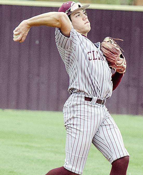 Clinton’s Easten Powell tosses the ball to the pitcher during the Reds’ home game Friday against the Kingfisher Yellowjackets. CDN | Sam Goodwyn