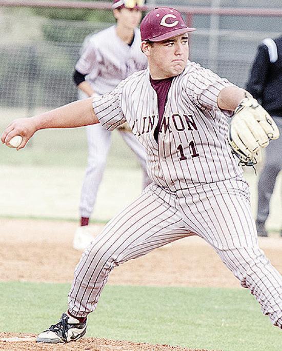 Clinton’s Eli Anderson pitches during the Reds’ home game against the Kingfisher Yellowjackets. CDN | Sam Goodwyn