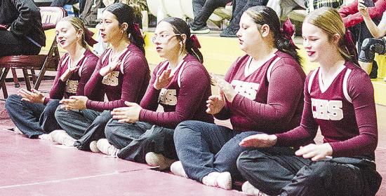 Cheering on the wrestlers