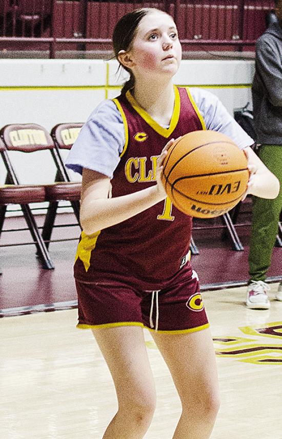Clinton’s Quincy Matlock squares up to shoot the ball during practice in the Tornado Dome. CDN |Sam Goodwyn