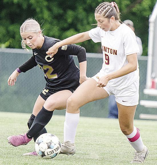No. 9 Maddi McAtee, right, fights against the Chickasha defender during Clinton’s road win over the Lady Chicks Thursday in the first round of the playoffs. CDN | Sam Goodwyn