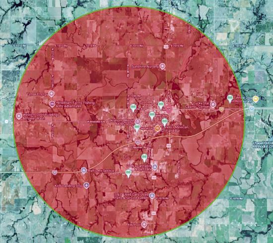 This map displays the coverage area of the tornado sirens in red, which are designed to monitor and detect possible storm cells forming within five miles of city limits. The green icons on the map indicate locations of the tornado sirens being upgraded. C