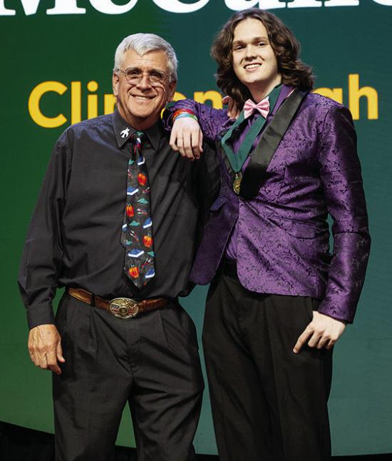 Wes Miller, left, stands with honoree Jackson McCullough during the 40th Academic All-State Awards Celebration. CDN | Courtesy photo