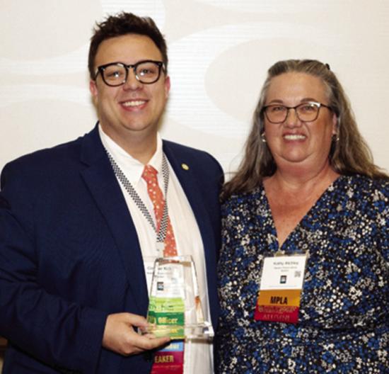 WPLS Director of Customer Experience Conner Kirk, left, is presented OLA’s 2026 New Librarian of the Year Award by Kathy Atchley. CDN | Courtesy photo